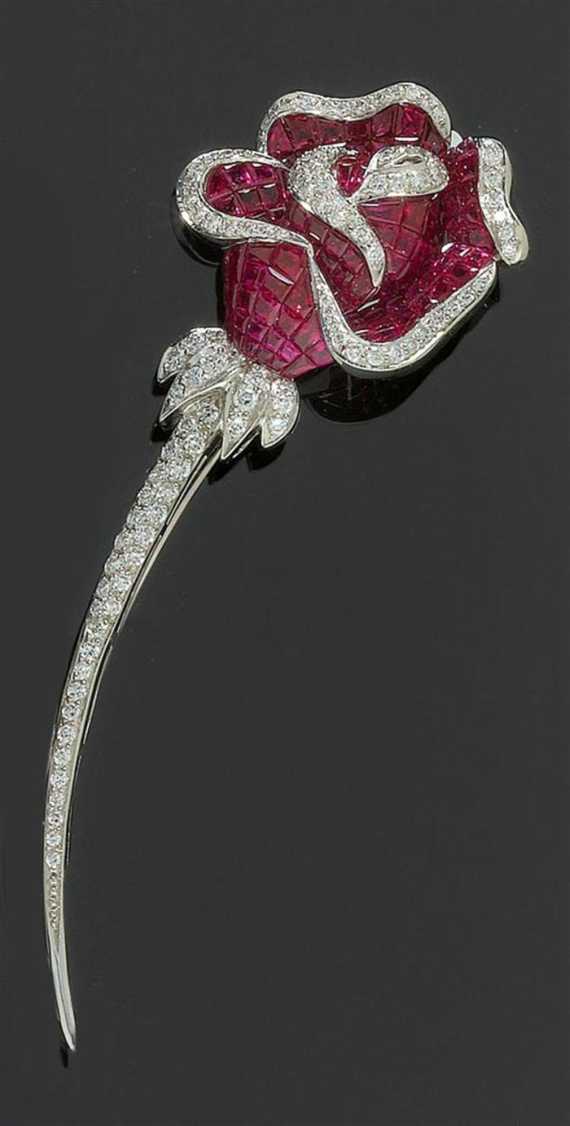 Appraisal: RUBY AND BRILLIANT-CUT DIAMOND BROOCH White gold Very decorative elegant