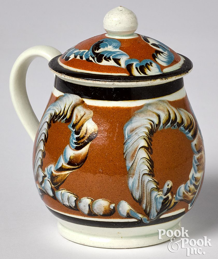 Appraisal: Mocha mustard pot Mocha mustard pot with earthworm decoration h