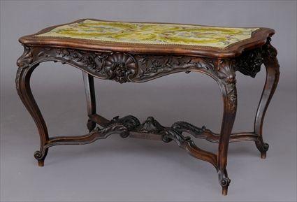 Appraisal: RENAISSANCE REVIVAL CARVED WALNUT CENTER TABLE WITH NEEDLEWORK TOP Of