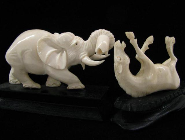 Appraisal: Two Carved Ivory Animal Figures including '' long elephant and