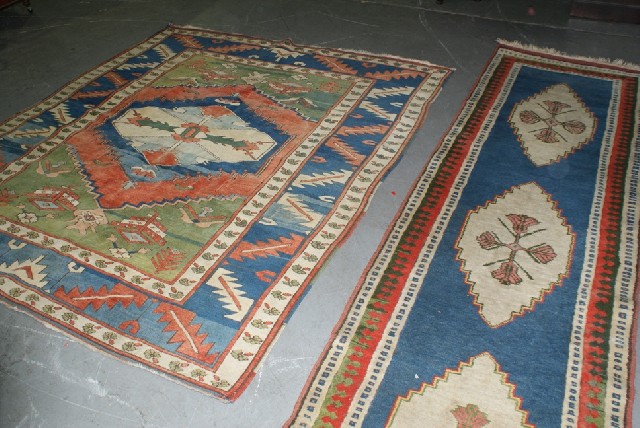 Appraisal: A Turkish tribal carpet cm wide cm long together with