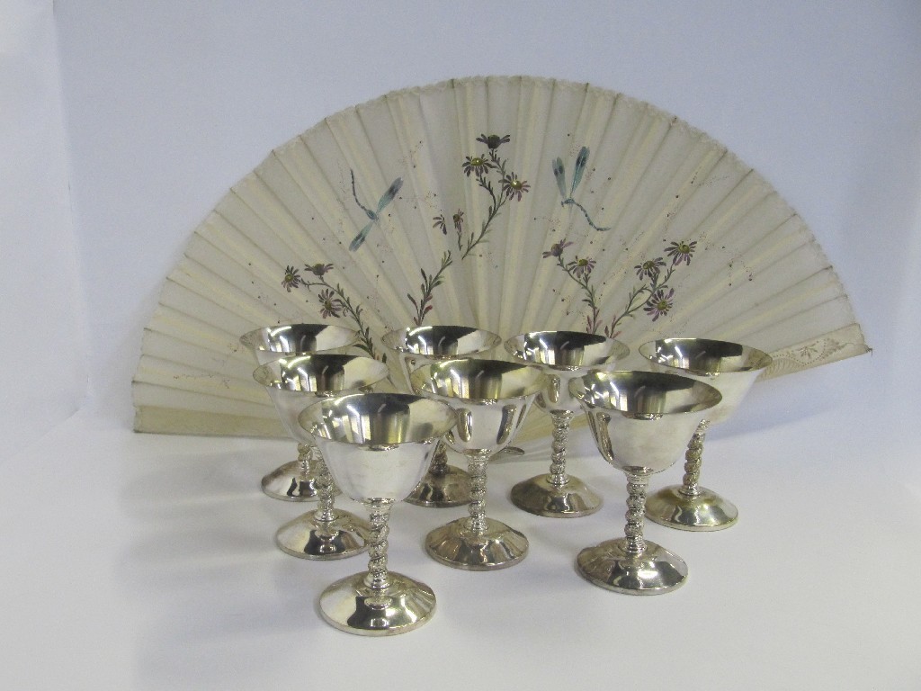 Appraisal: Eight Casa Popo metal goblets and an ivory fan