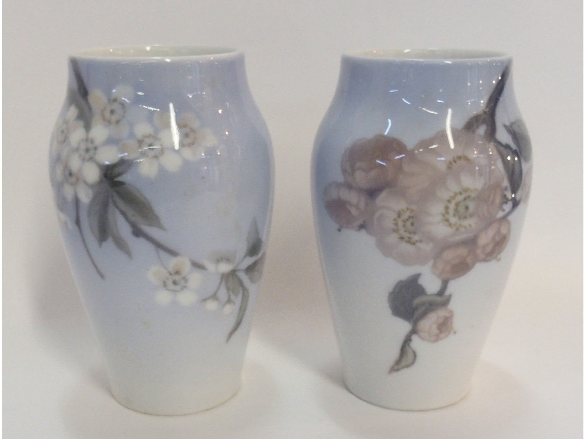 Appraisal: Two Royal Copenhagen vases and a Meissen figure of a