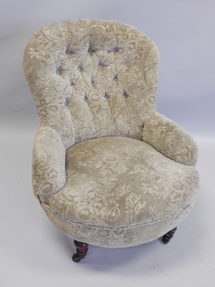 Appraisal: A Victorian mahogany armchair upholstered in buttoned dralon type fabric