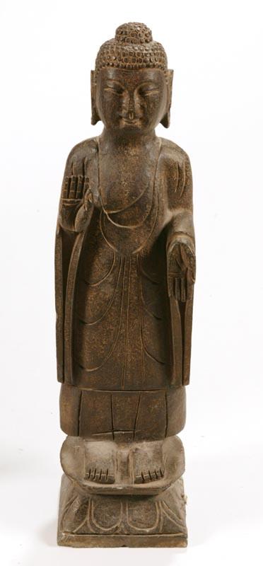 Appraisal: BUDDHA STATUE Asian th century dense stone Full-length robed Buddha