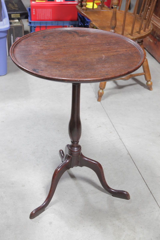 Appraisal: CANDLE STAND Dark stained walnut with a dish top and