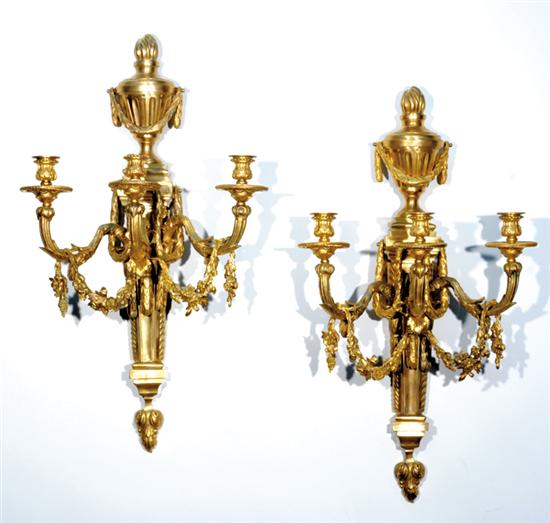 Appraisal: Pair Classical style brass sconces urn finial with swag above