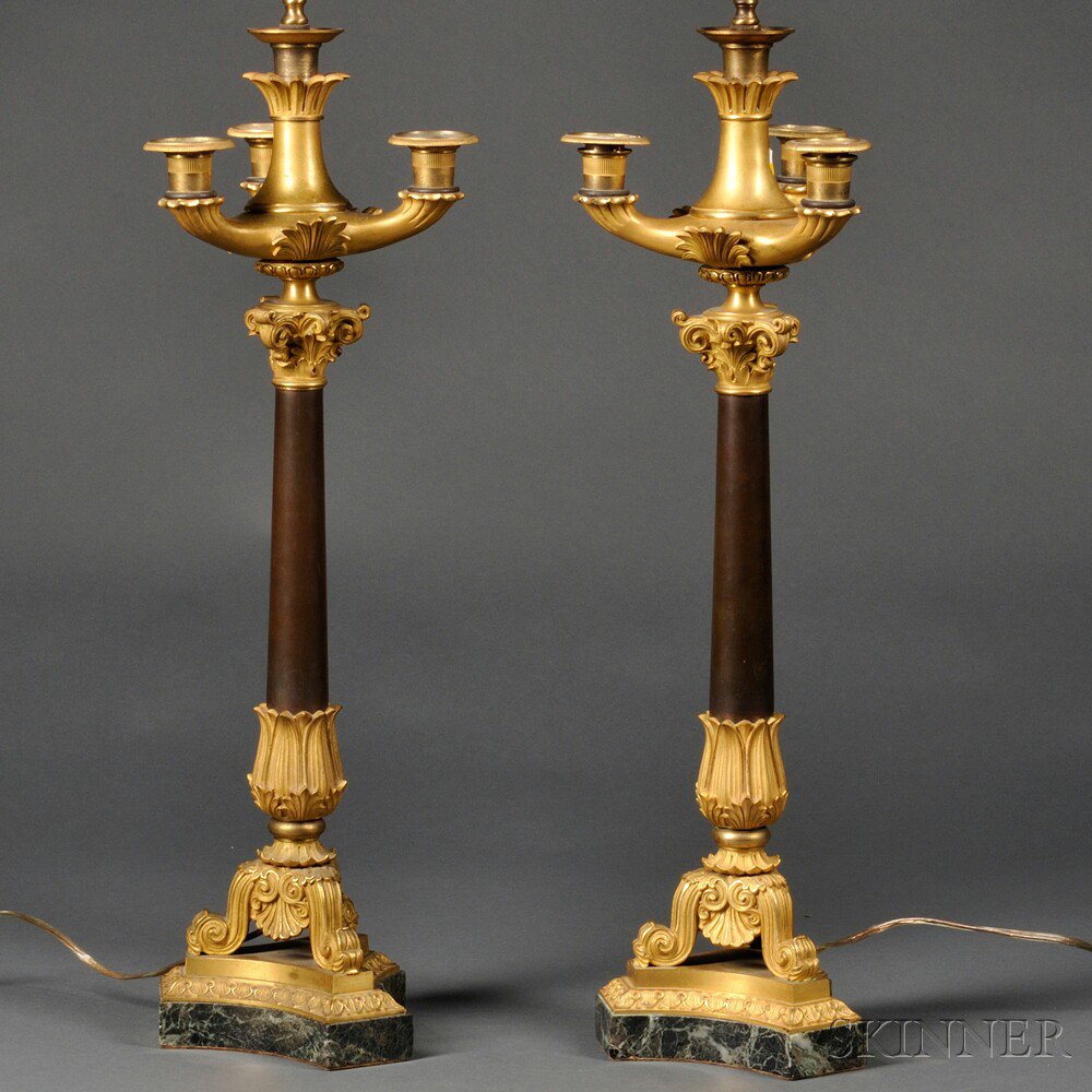 Appraisal: Pair of Bronze Four-light Candelabra electrified with two glass shades