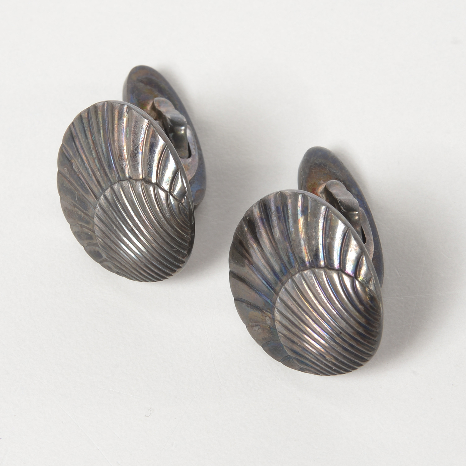 Appraisal: GEORG JENSEN PAIR STERLING SHELL CUFFLINKS th c stamped Georg