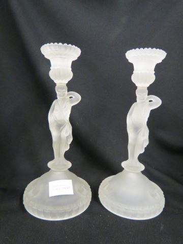 Appraisal: Pair of Pattern Glass Figural Candlesticks frosted figure stem lion