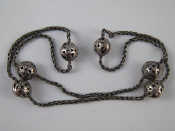 Appraisal: A white metal tests silver necklace Beads approx mm wide