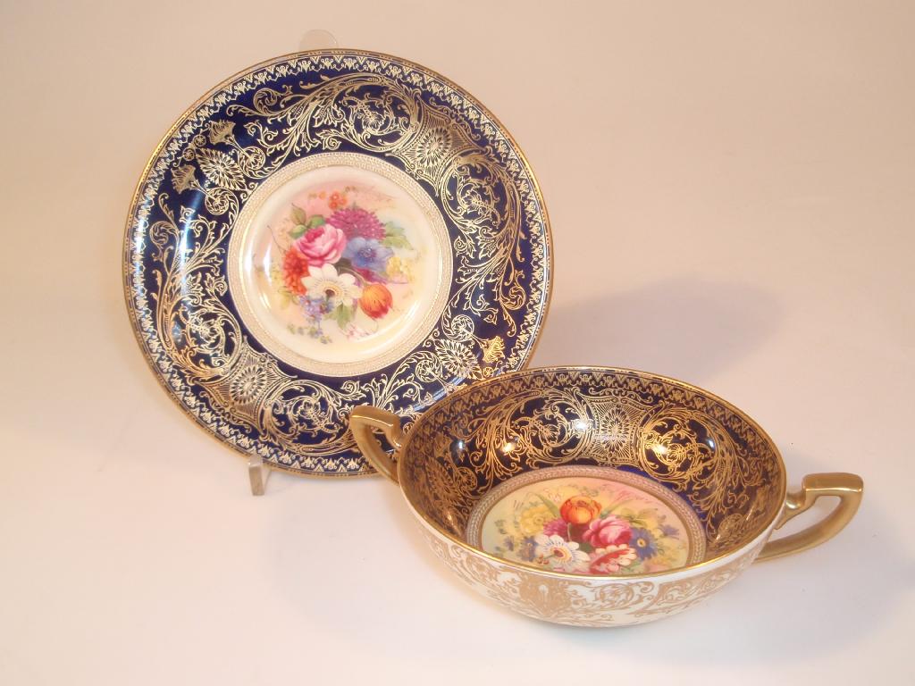 Appraisal: A Royal Worcester porcelain two-handled soup dish and stand painted