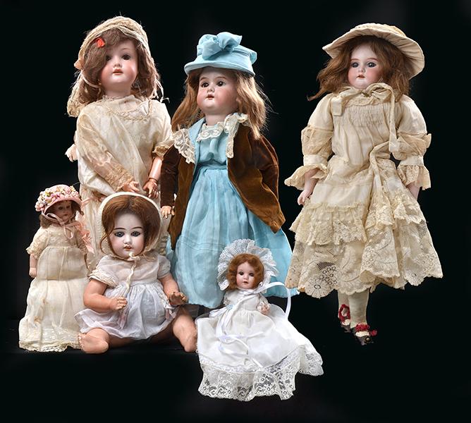 Appraisal: A COLLECTION OF SIX BISQUE HEAD DOLLS incl AM bisque