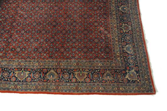 Appraisal: ROOM SIZE ORIENTAL RUG Twentieth century Red field with multiple