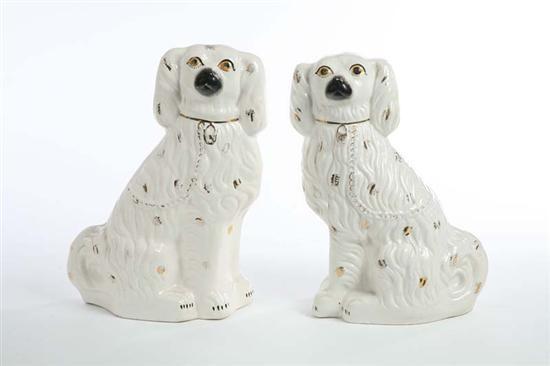 Appraisal: PAIR OF STAFFORDSHIRE SPANIELS Large seated spaniels with gilt collar