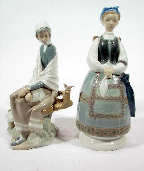 Appraisal: Two Lladro porcelain figures - one a girl with a