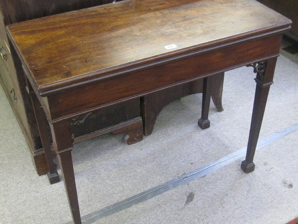 Appraisal: Antique mahogany turnover card table in the Chippendale style