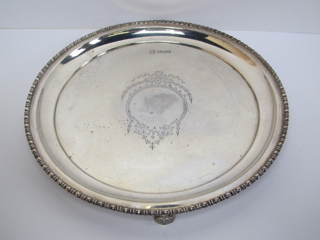 Appraisal: A silver card tray on three scroll feet Sheffield