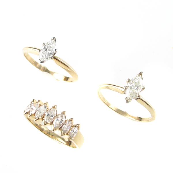 Appraisal: A collection of two marquise-cut diamond and k gold solitaire