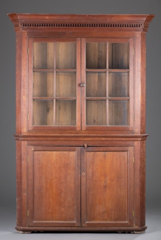 Appraisal: Late Chippendale Style Corner Cupboard Cherry one piece construction molded