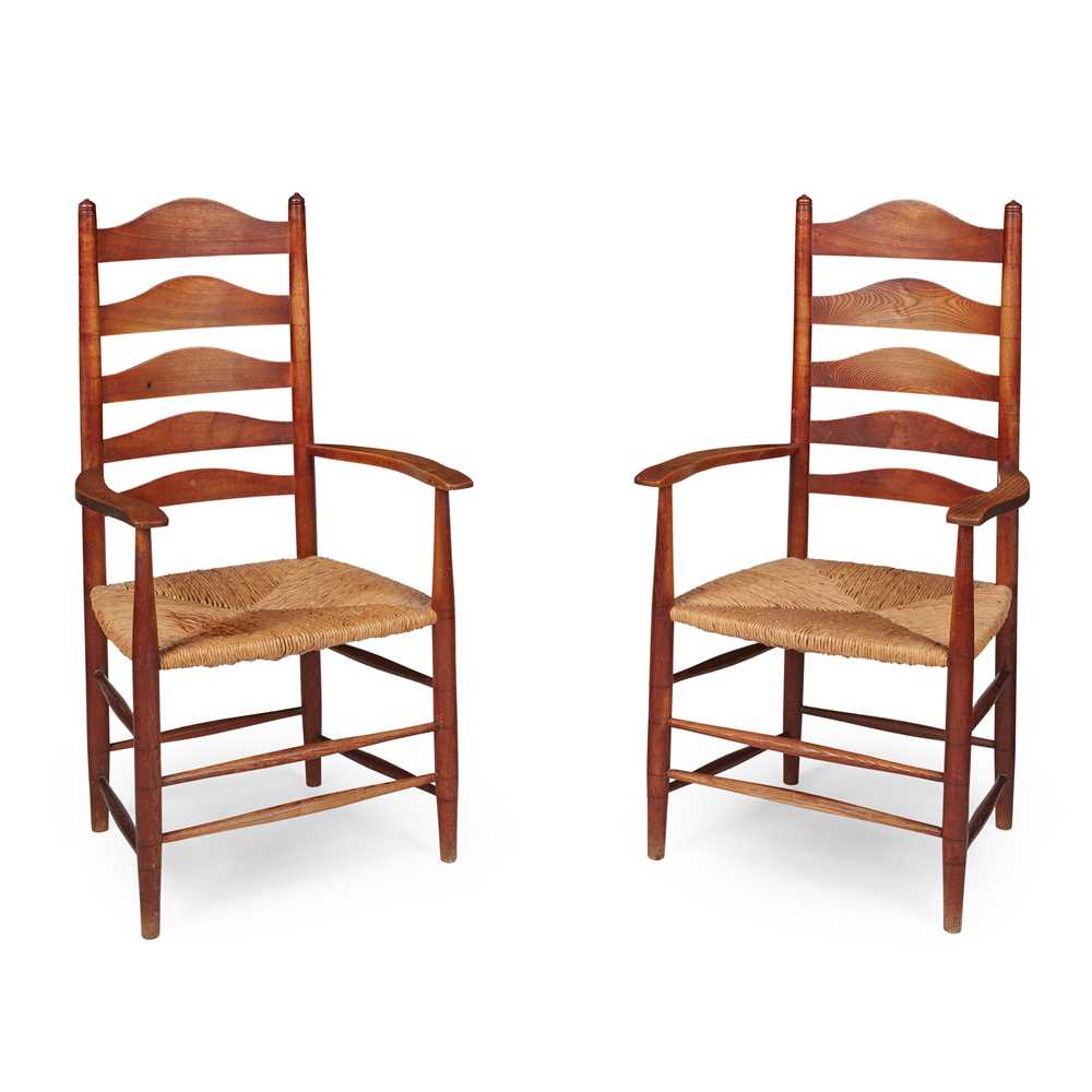 Appraisal: ERNEST GIMSON BRITISH - PAIR OF LADDERBACK ARMCHAIRS oak and