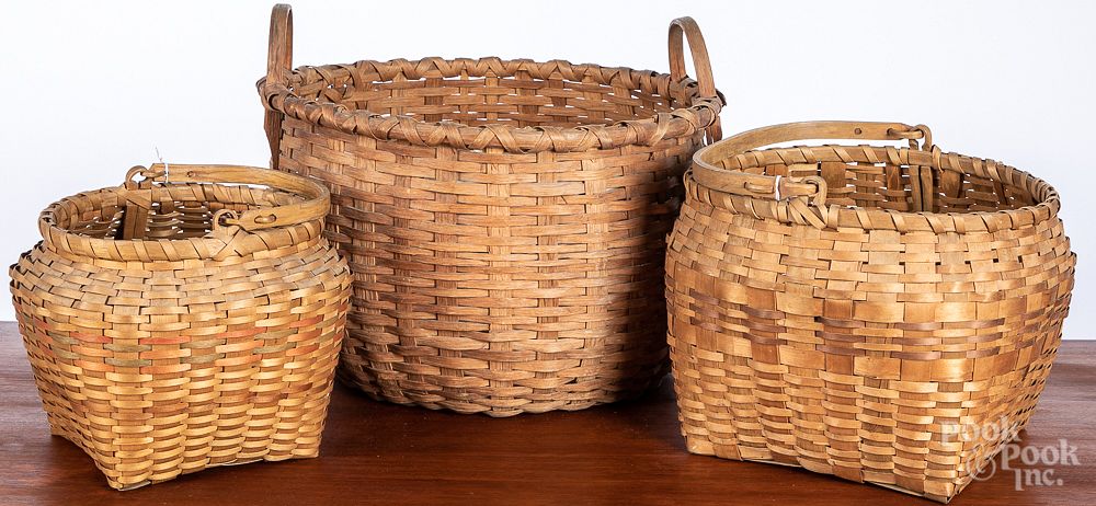 Appraisal: Three woven baskets Three woven baskets largest - h w