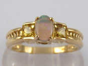 Appraisal: A carat gold opal and yellow beryl ring size N