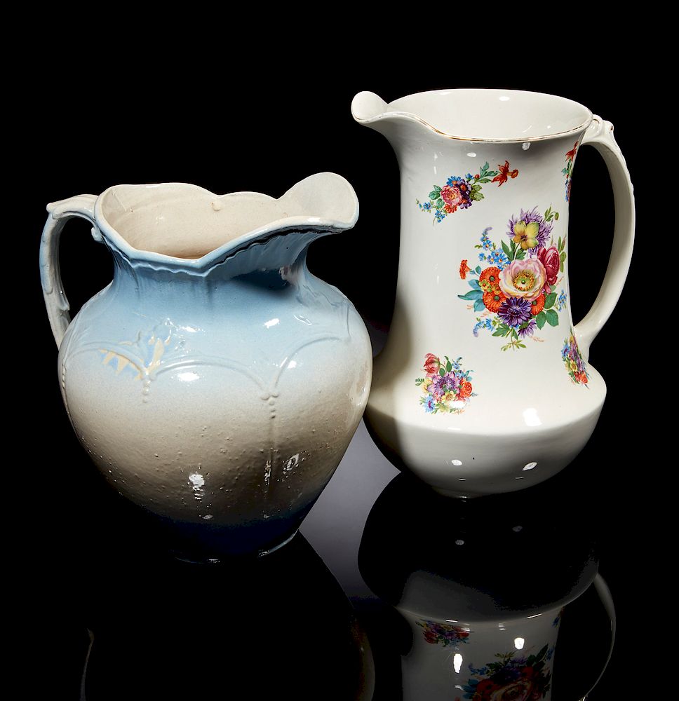 Appraisal: Two Large Pitchers Two large pitchers comprising a blue and