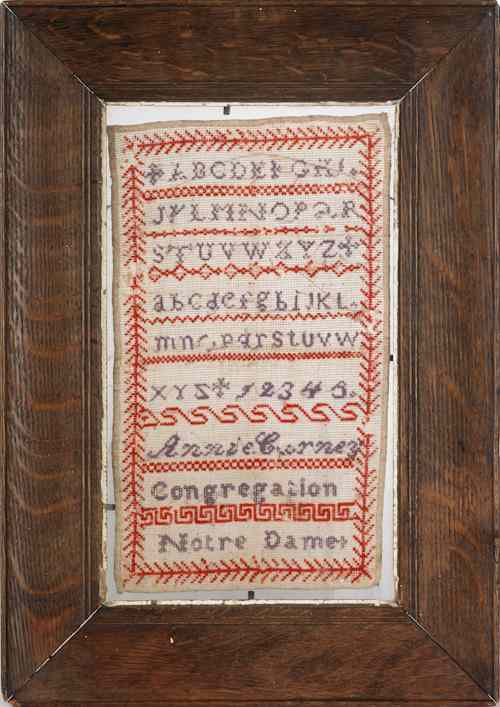 Appraisal: Wool marking sampler inscribed Annie Carney Congregation Notre Dame x