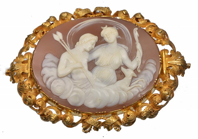 Appraisal: A VICTORIAN OVAL CAMEO BROOCH carved with the figures of