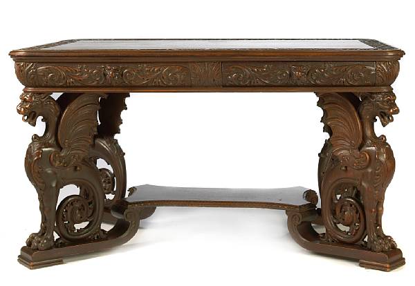 Appraisal: A Renaissance Revival carved oak center table height in width