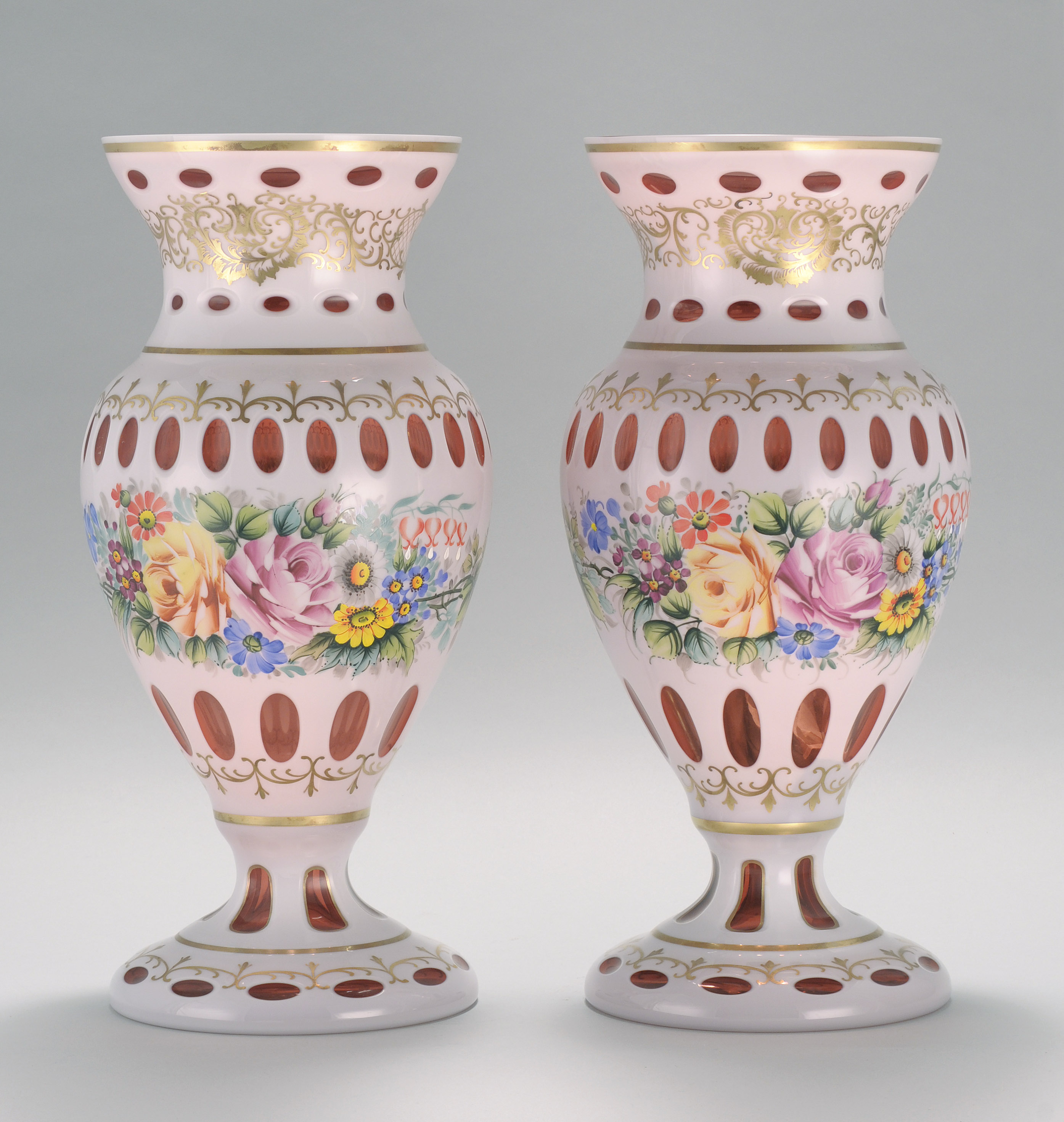 Appraisal: PAIR OF CZECHOSLOVAKIAN OVERLAY GLASS VASES Mid- th CenturyIn opaque