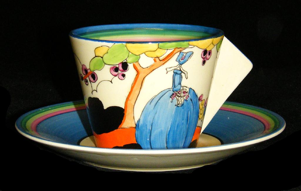 Appraisal: Idyll' Bizarre conical coffee cup and saucer