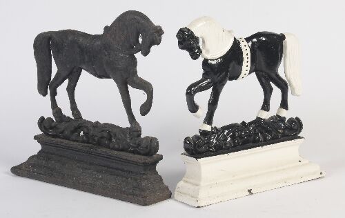 Appraisal: A pair of Victorian cast iron door stops in the