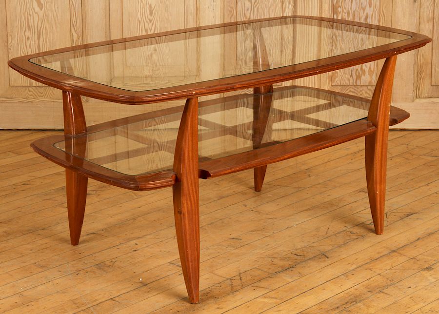 Appraisal: UNUSUAL ITALIAN MAHOGANY COFFEE TABLE C An unusual Italian mahogany