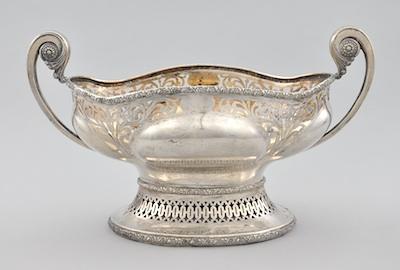 Appraisal: A German Silver Centerpiece In a lobbed ovoid form with