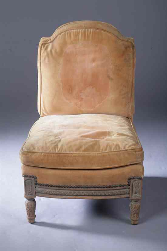 Appraisal: CONTINENTAL NEO-CLASSICAL STYLE SLIPPER CHAIR th century Arching padded back