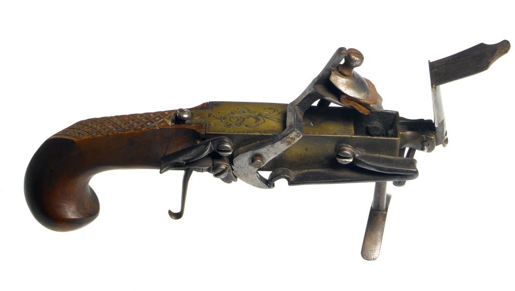 Appraisal: AN ENGLISH FLINTLOCK TINDER-LIGHTER of steel and engraved brass decorated