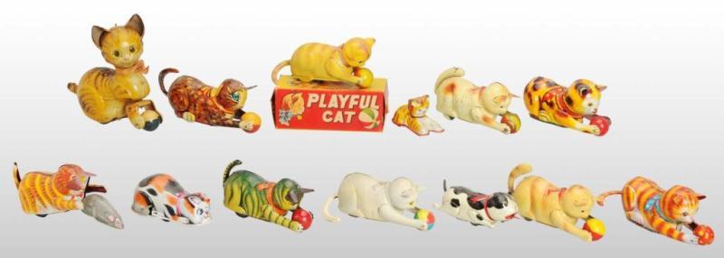 Appraisal: Lot of Tin Cat Wind-Up Friction Toys Description Japanese Includes