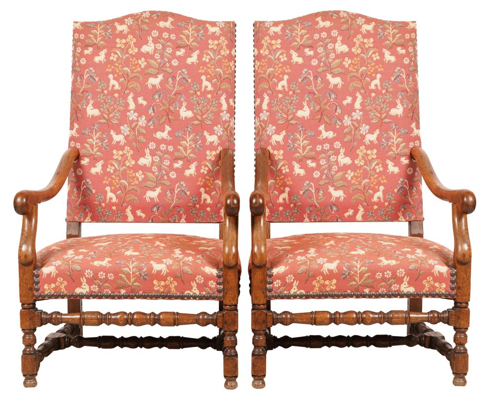 Appraisal: PAIR OF CARVED OAK HALL CHAIRScovered with red-ground tapestry-style fabric