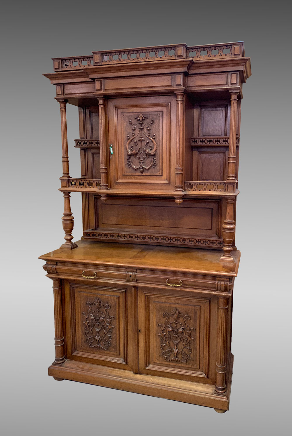 Appraisal: BELGIAN CARVED OAK STEPBACK CUPBOARD Belgian stepback cupboard having carved