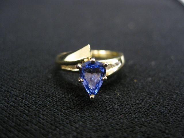 Appraisal: Tanzanite Ring pear shaped carat gem with diamonds on each