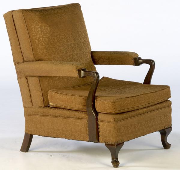 Appraisal: LOUNGE CHAIR Upholstered back and seat with wooden arms and