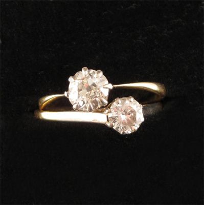 Appraisal: A diamond solitaire ring set in gold Size R And