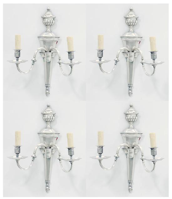 Appraisal: Set of four silverplate wall sconces urn finial and paneled