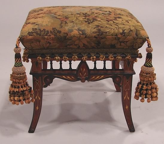 Appraisal: Ottoman with walnut and ebonized with incised gilt frame t