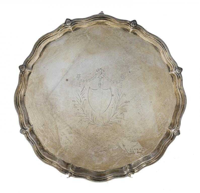 Appraisal: A VICTORIAN WAITER engraved with a neo classical cartouche in