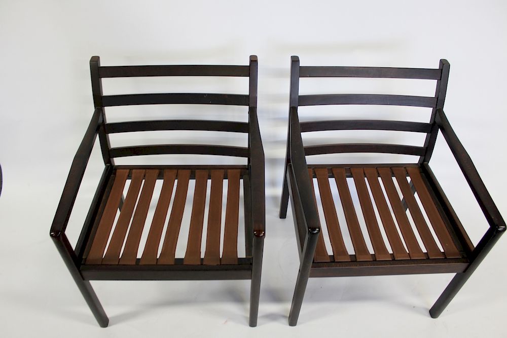 Appraisal: MIDCENTURY Pair of Rosewood Arm Chairs Signed on the webbing