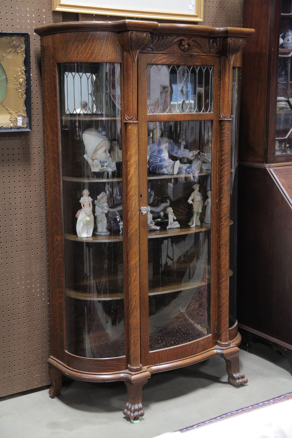 Appraisal: CHINA CABINET American early th century Oak having a carved