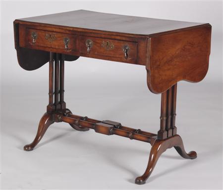 Appraisal: A William and Mary style walnut sofa table the crossbanded